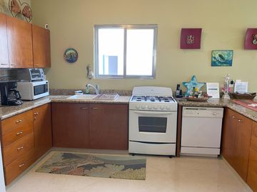 Departamento de 2 Recámaras Frente a la Marina En Venta - Puerto Aventuras
