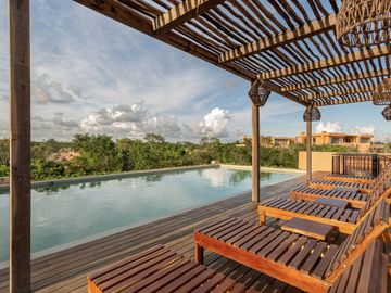 CASA EN VENTA EN TULUM 2 HABITACIONES CON 2 ALBERCAS PARA ADULTOS Y NIÑOS ZONA DE ALTA PLUSVALÍA