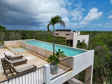 Penthouse amueblado en venta en Chemuyil