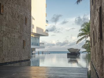Departamento en VENTA BEACH FRONT PUERTO MORELOS 1 RECAMARA TIPO LOFT AMENIDADES DE LUJO