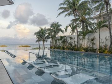 Departamento en VENTA BEACH FRONT PUERTO MORELOS 1 RECAMARA TIPO LOFT AMENIDADES DE LUJO