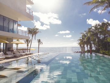 Departamento en VENTA BEACH FRONT PUERTO MORELOS 1 RECAMARA AMENIDADES DE LUJO