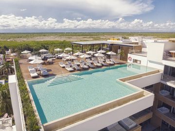 Departamento en VENTA BEACH FRONT PUERTO MORELOS 1 RECAMARA PENTHOUSE CON ALBERCA AMENIDADES DE LUJO