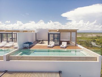 Departamento en VENTA BEACH FRONT PUERTO MORELOS 1 RECAMARA PENTHOUSE CON ALBERCA AMENIDADES DE LUJO