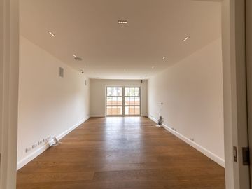 DEPARTAMENTO COMO CASA EN VENTA DE ESTRENO CON JARDÍN Y PARQUE EN SAN ISIDRO