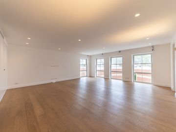 DEPARTAMENTO COMO CASA EN VENTA DE ESTRENO CON JARDÍN Y PARQUE EN SAN ISIDRO