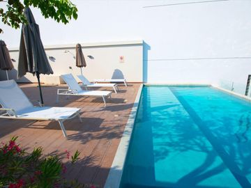 DEPARTAMENTO DE LUJO EN VENTA EN PLAYA DEL CARMEN A MEDIA CUADRA DE LA 5TA AV.