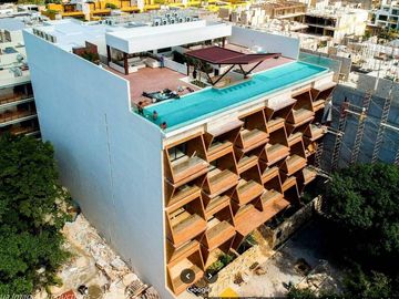 DEPARTAMENTO DE LUJO EN VENTA EN PLAYA DEL CARMEN A MEDIA CUADRA DE LA 5TA AV.