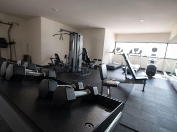 DEPARTAMENTO DE LUJO EN VENTA EN PLAYA DEL CARMEN A MEDIA CUADRA DE LA 5TA AV.