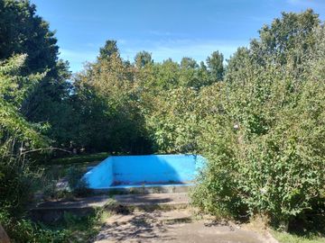 LOTE DE 2 HECTAREAS CON 2 GALPONES Y 3 CASAS EN LA GLORIA DE LA PELEGRINA