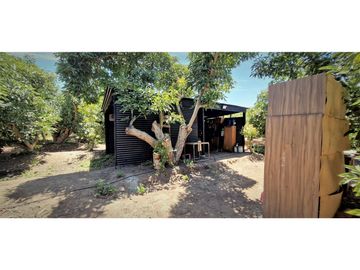 Venta de parcela con casa de 1 dormitorio, en Condominio exclusivo en La Cruz