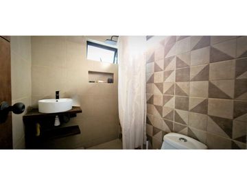 Venta de parcela con casa de 1 dormitorio, en Condominio exclusivo en La Cruz