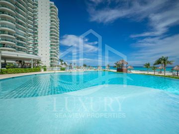 EN VENTA. Hermoso Departamento frente a las impactantes playas de Cancún. Bay View Grand.