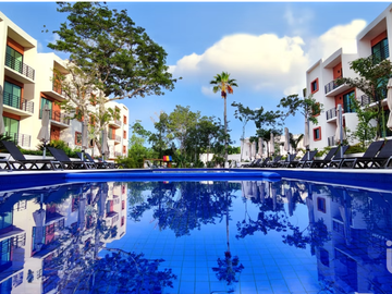 Departamento en Venta en Av. Huayacán Cancún, 2 recamaras, con Albercas y 12 Amenidades