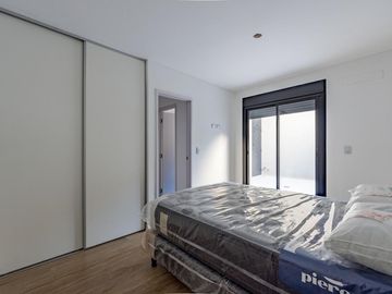 VENTA- Departamento - A estrenar - 2 dormitorios con Patio y Cochera- Centro, Rosario.