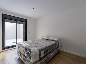 VENTA- Departamento - A estrenar - 2 dormitorios con Patio y Cochera- Centro, Rosario.