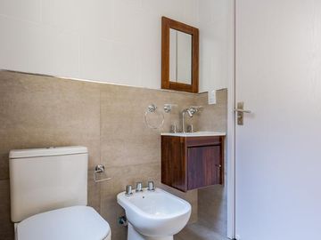 VENTA- Departamento - A estrenar - 2 dormitorios con Patio y Cochera- Centro, Rosario.