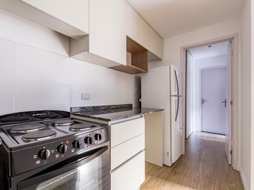 VENTA- Departamento - A estrenar - 2 dormitorios con Patio y Cochera- Centro, Rosario.
