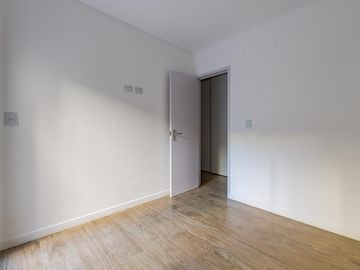 VENTA- Departamento - A estrenar - 2 dormitorios con Patio y Cochera- Centro, Rosario.