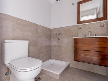 VENTA- Departamento - A estrenar - 2 dormitorios con Patio y Cochera- Centro, Rosario.