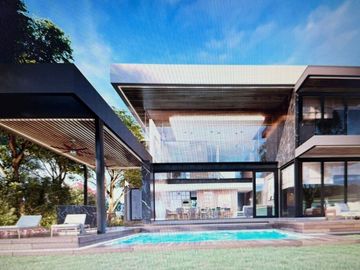 CASA EN VENTA EN EL YUCATAN COUNTRY CLUB, VISTA AL LAGO Y AL CAMPO DE GOLF