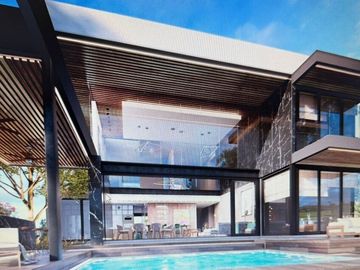 CASA EN VENTA EN EL YUCATAN COUNTRY CLUB, VISTA AL LAGO Y AL CAMPO DE GOLF