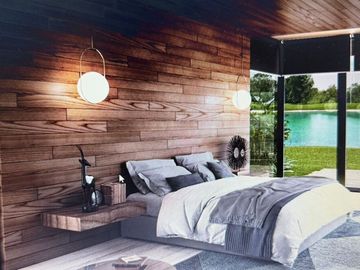 CASA EN VENTA EN EL YUCATAN COUNTRY CLUB, VISTA AL LAGO Y AL CAMPO DE GOLF