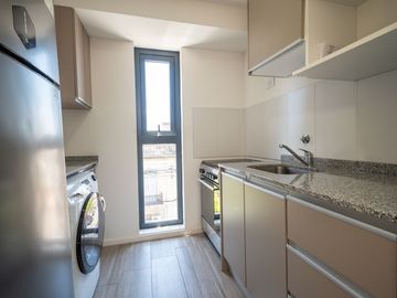 VENTA SEMIPISO DOS DORMITORIOS EN TORRE LYON