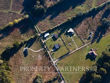 Oportunidad inversión: 3 casas en 1/2 Ha con flujo inmediato