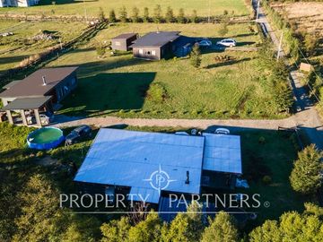 Oportunidad inversión: 3 casas en 1/2 Ha con flujo inmediato