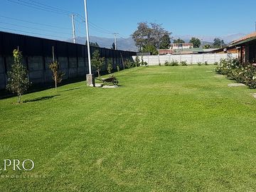 EXQUISITA PARCELA CON 2 CASAS EN RENGO A MINUTOS DEL CENTRO