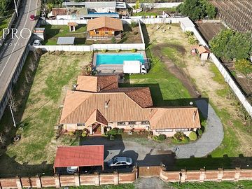 EXQUISITA PARCELA CON 2 CASAS EN RENGO A MINUTOS DEL CENTRO