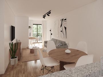 Departamento con balcón y patio en primero piso