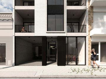 Departamento con balcón y patio en primero piso