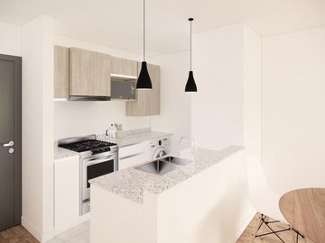Departamento con balcón y patio en primero piso