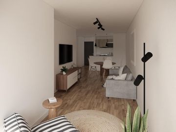Departamento con balcón y patio en primero piso