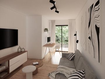 Departamento con balcón y patio en primero piso