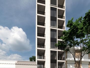 Departamento con balcón y patio en primero piso