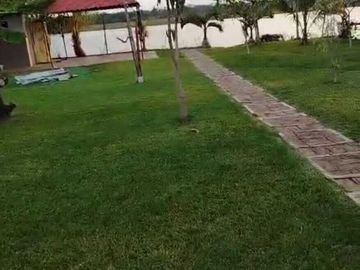 CASA DE CAMPO AMPLIO TERRENO FRENTE AL RIO TUXPAN.