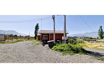 Terreno de 10.300 m2., en  Llay Llay, con dos galpones, bodegas, casa y oficinas.