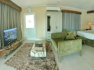 Finest Residential Service Property nestled in a tropical park with ocean view