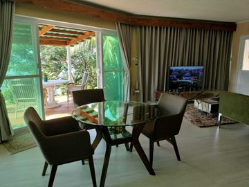Finest Residential Service Property nestled in a tropical park with ocean view