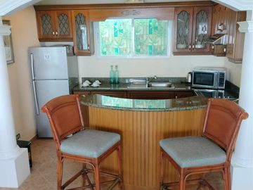Finest Residential Service Property nestled in a tropical park with ocean view