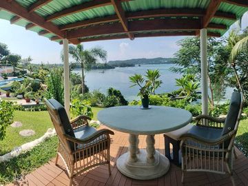 Finest Residential Service Property nestled in a tropical park with ocean view