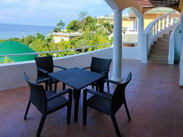 Finest Residential Service Property nestled in a tropical park with ocean view