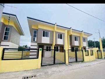 townhouse with  fence and gate