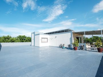 Elegant 4 Bedroom Fairway House and Lot with roofdeck in Manila Southwoods