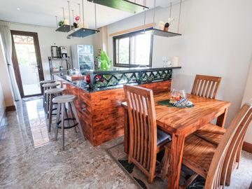 Elegant 4 Bedroom Fairway House and Lot with roofdeck in Manila Southwoods