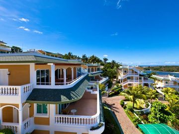 Finest Residential Service Property nestled in a tropical park with ocean view