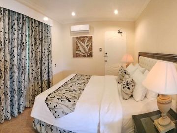 Finest Residential Service Property nestled in a tropical park with ocean view